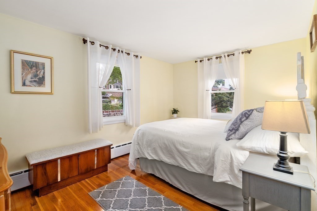 1 Bow Street Wellesley, MA 02481 - Photo 15 of 37 a bedroom with a bed and a window