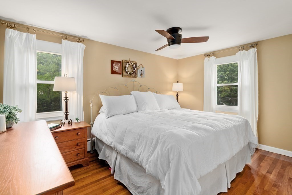 1 Bow Street Wellesley, MA 02481 - Photo 17 of 37 a bedroom with bed and wooden floor