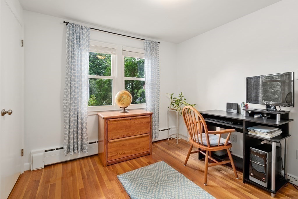 1 Bow Street Wellesley, MA 02481 - Photo 19 of 37 a view of a workspace with furniture and a window