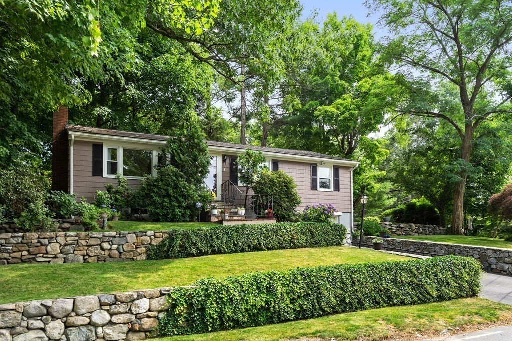 1 Bow Street Wellesley, MA 02481 - Photo 2 of 37 a front view of a house with a yard