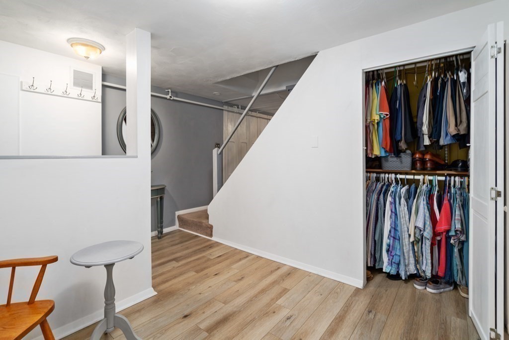 1 Bow Street Wellesley, MA 02481 - Photo 26 of 37 a view of walk in closet with clothes and shoes
