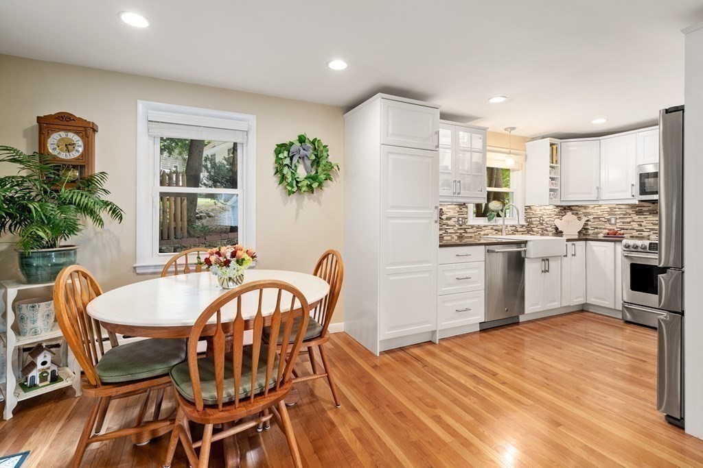 1 Bow Street Wellesley, MA 02481 - Photo 9 of 37 a view of a dining room with furniture and chandelier