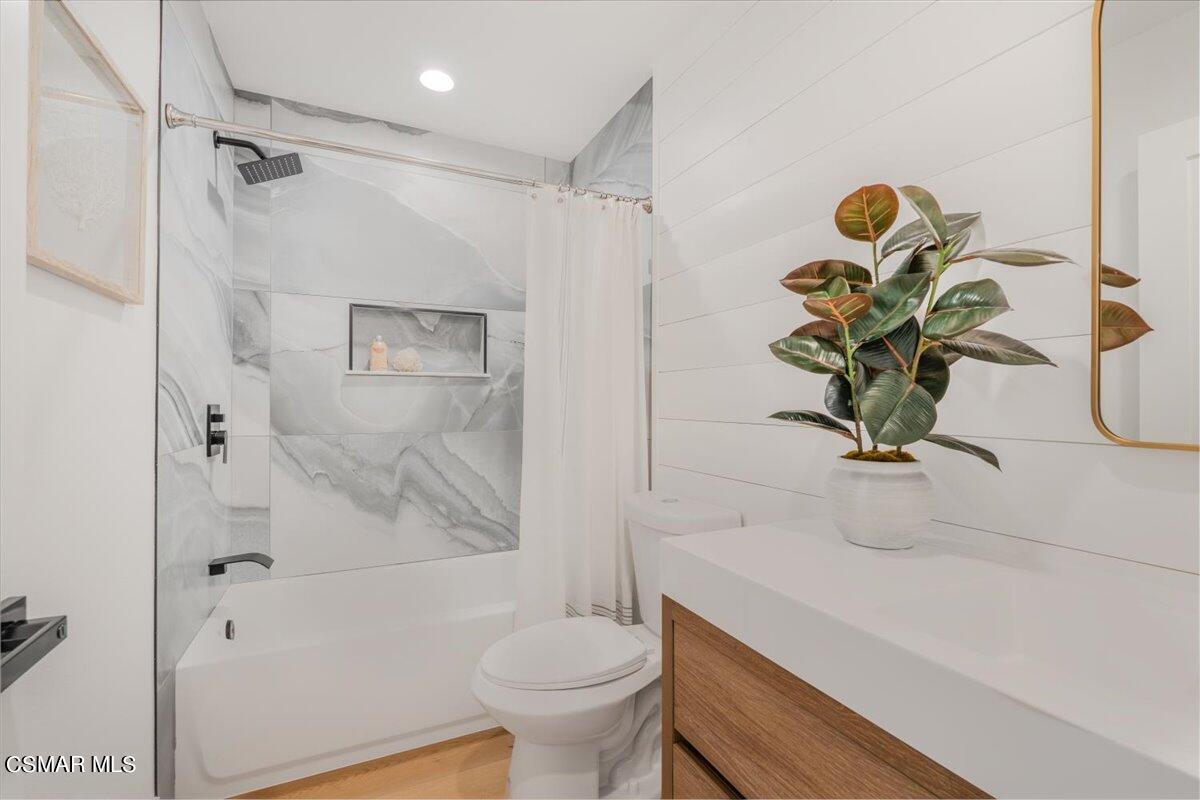 2335 Vina Del Mar Oxnard, CA 93035 - Photo 35 of 57 a bathroom with a sink a toilet and shower