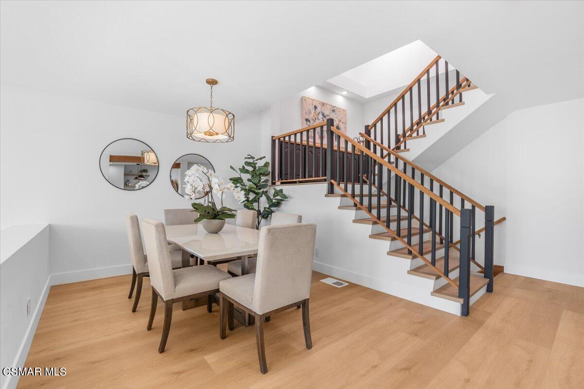 2335 Vina Del Mar Oxnard, CA 93035 - Photo 7 of 57 a view of a dining room furniture and wooden floor