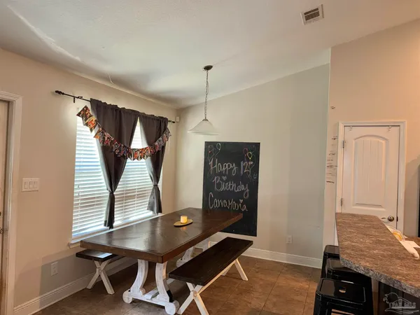 a room with furniture and window