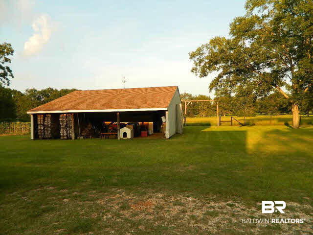 21372 County Road 49 Silverhill, AL 36576 - Photo 3 of 50 Shop has lovely design shingles and plenty of room for all your storage and projects.