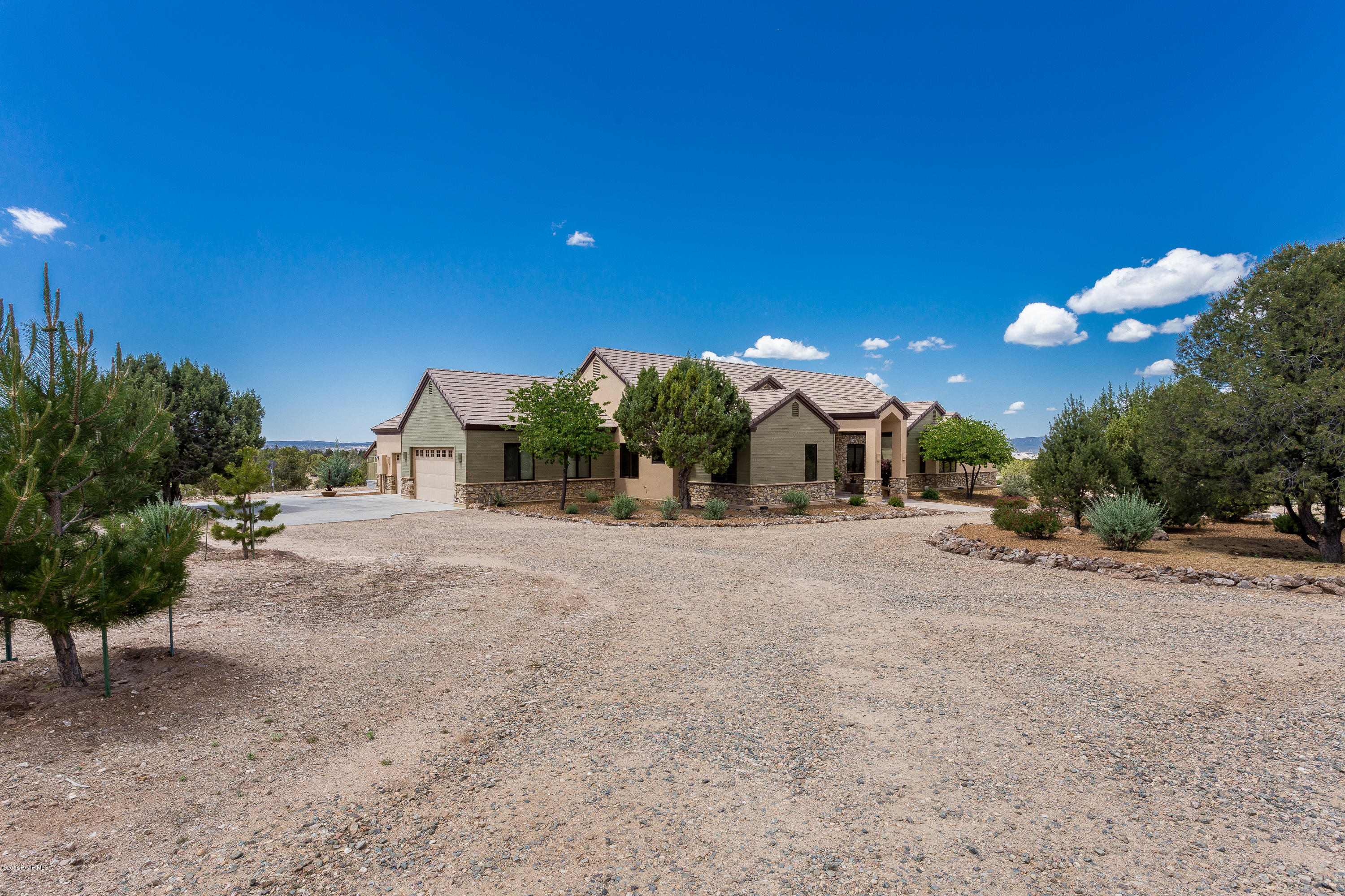 18401 Crossroads Ranch Road Prescott, AZ 86305 - Photo 2 of 51 a view of a house with a backyard