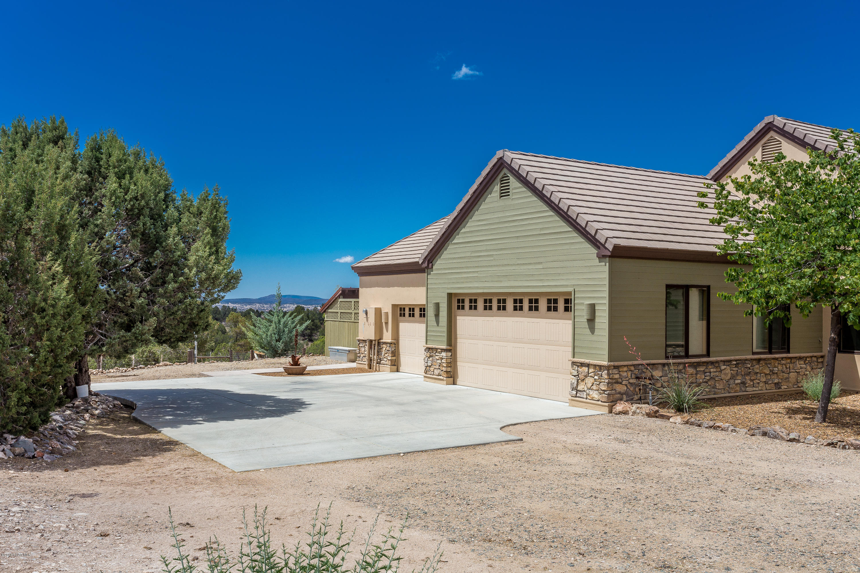 18401 Crossroads Ranch Road Prescott, AZ 86305 - Photo 40 of 51 a view of a house with a backyard