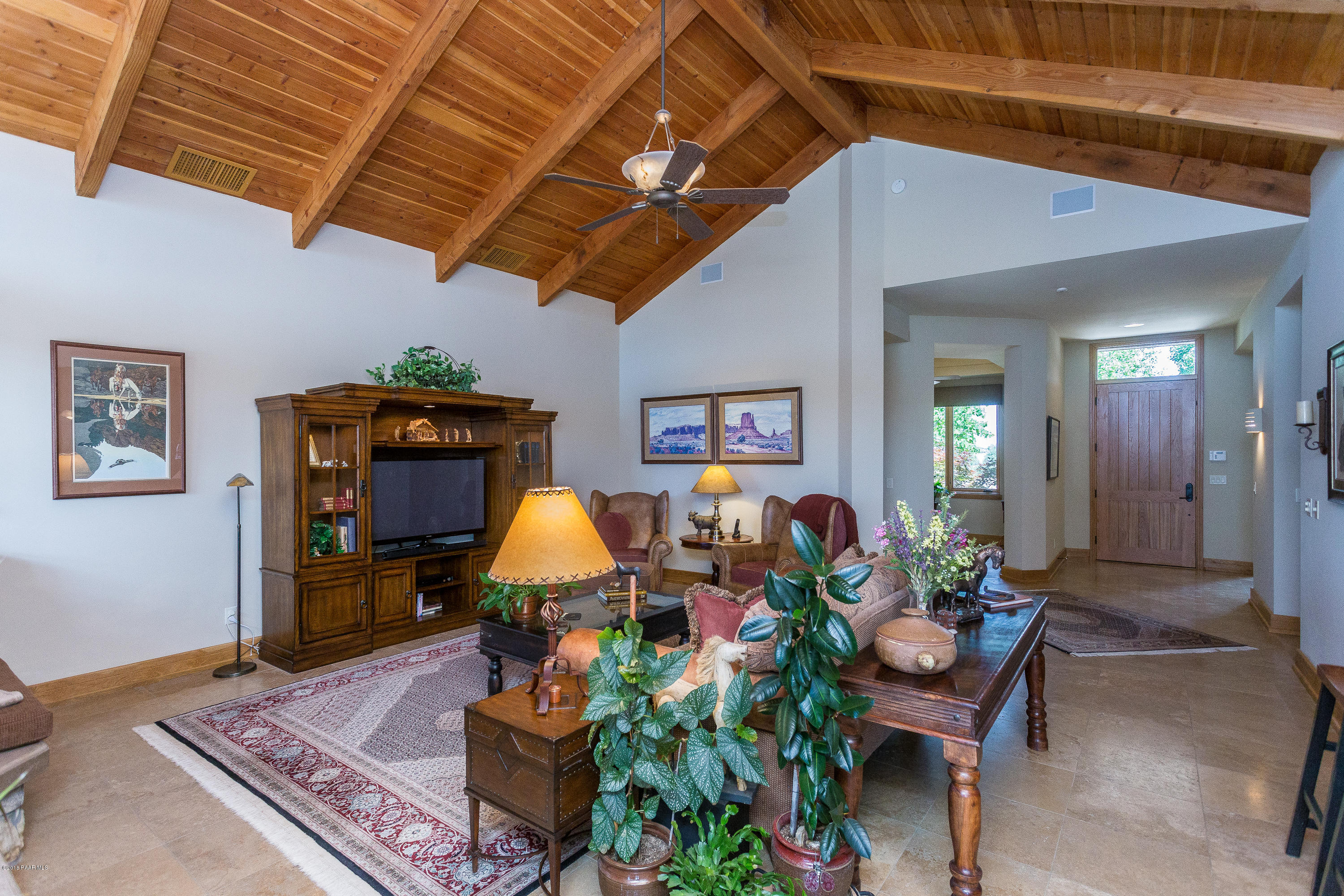 18401 Crossroads Ranch Road Prescott, AZ 86305 - Photo 5 of 51 a living room filled with furniture and a table
