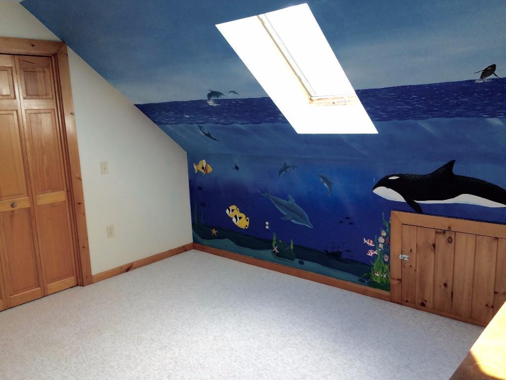 884 Tremont Road Bernard, ME 04612 - Photo 16 of 24 Bedroom on second floor with art...