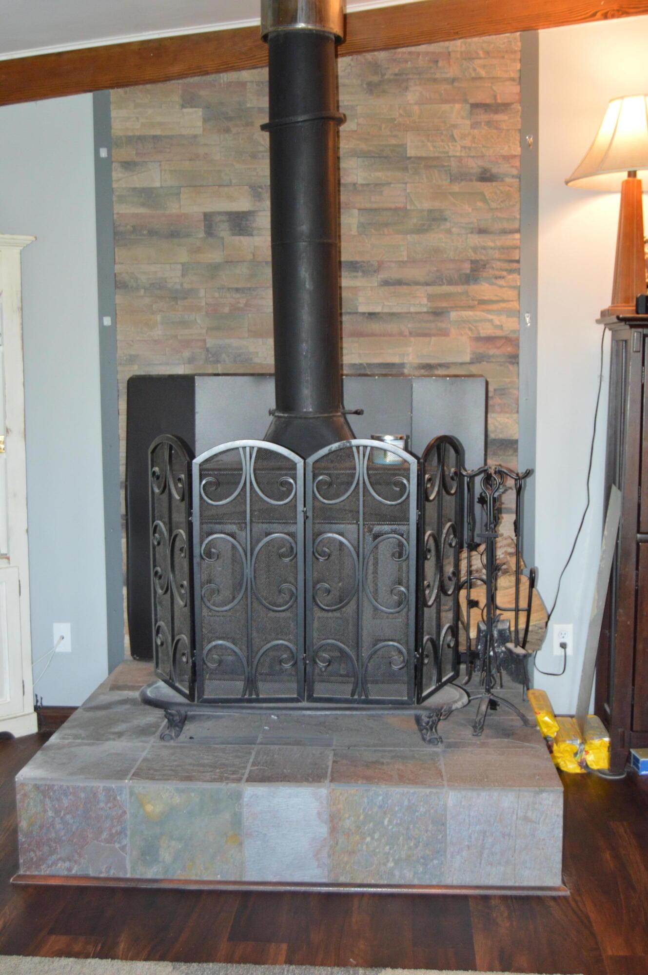 3542 Briggs Road Columbus, OH 43204 - Photo 7 of 22 wood burning stove