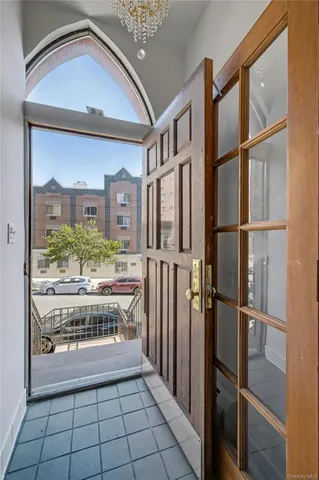 a view of a hallway with a outdoor space
