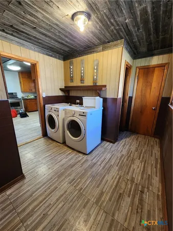 a utility room with dryer and washer