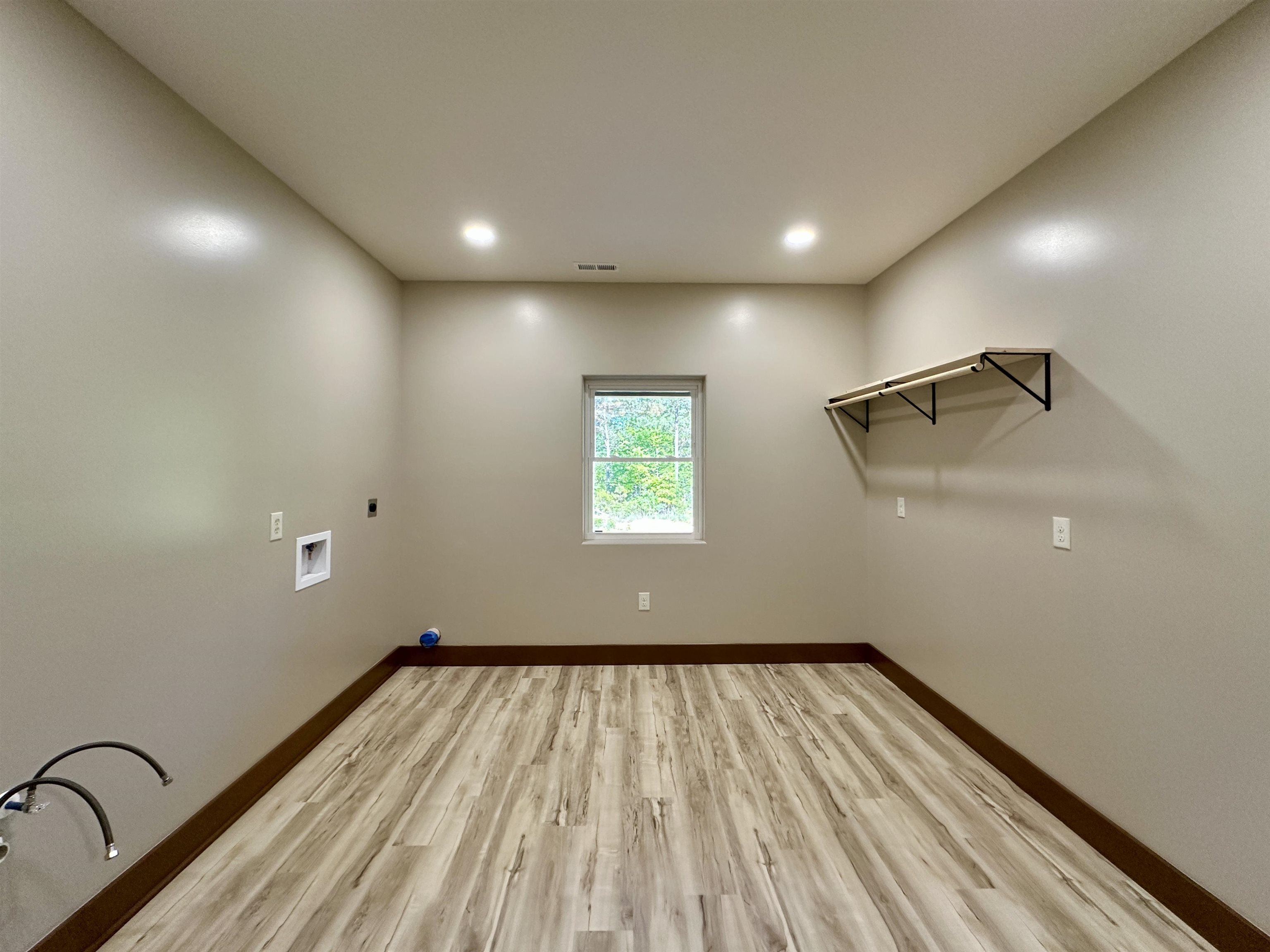 1137 Arl Bailey Road Finger, TN 38334 - Photo 15 of 40 a view of empty room with wooden floor