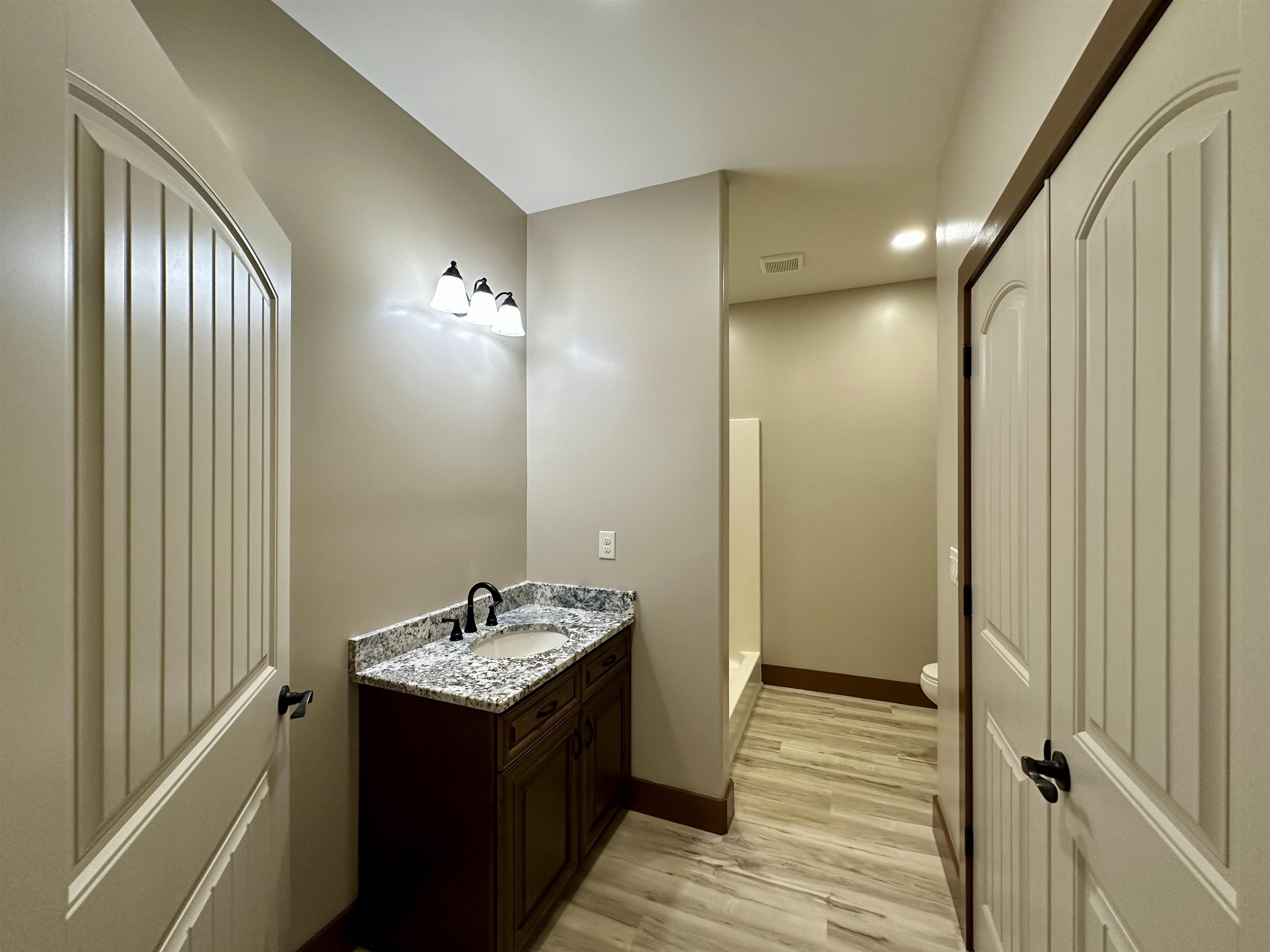 1137 Arl Bailey Road Finger, TN 38334 - Photo 20 of 40 a bathroom with a sink and a mirror