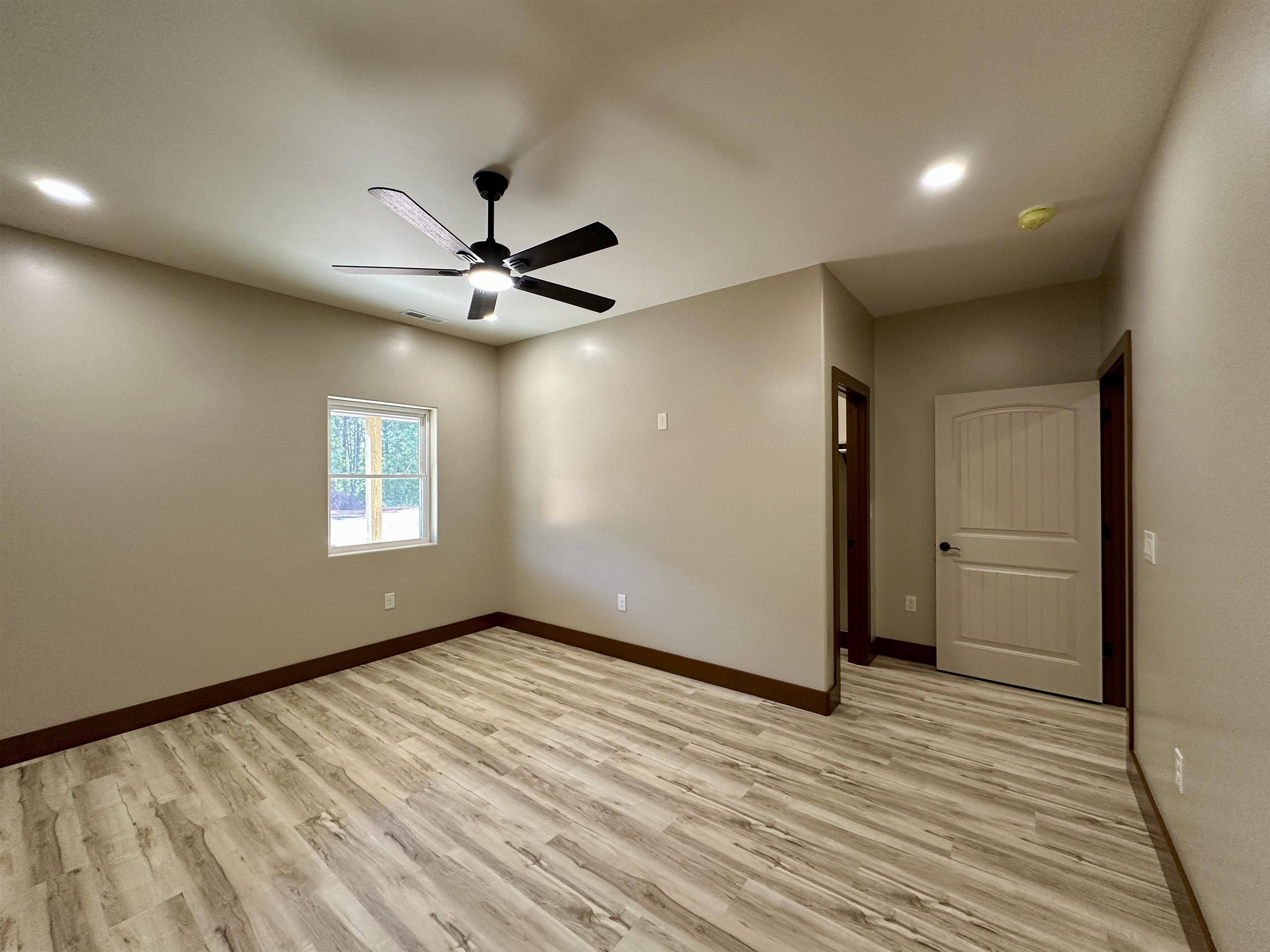 1137 Arl Bailey Road Finger, TN 38334 - Photo 23 of 40 a view of a livingroom with a ceiling fan and window