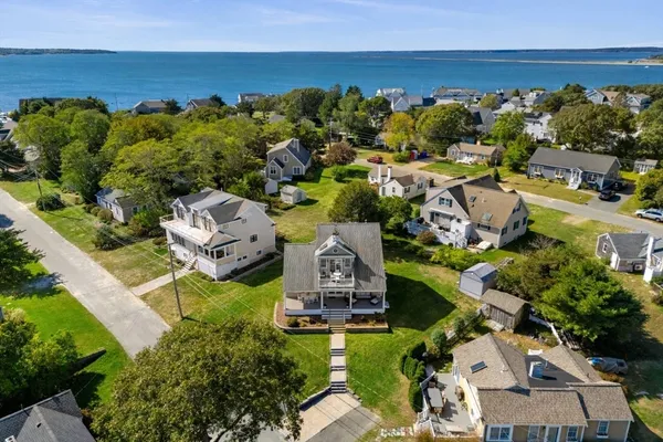 an aerial view of a house with a garden