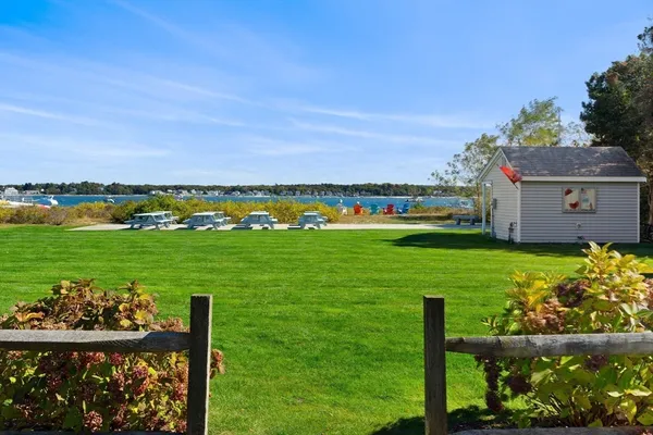 a view of a garden and deck