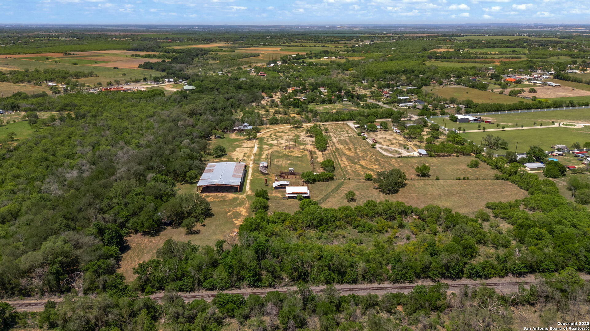 11224 Atkins Road Atascosa, TX 78002 - Photo 12 of 45 an aerial view of residential building with outdoor space