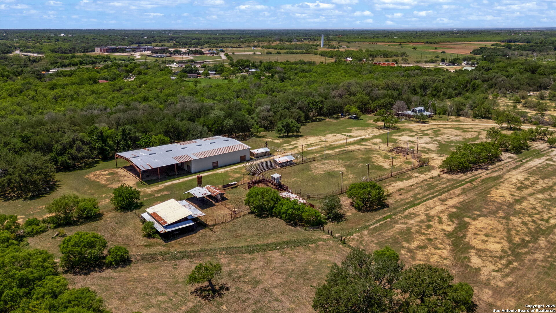 11224 Atkins Road Atascosa, TX 78002 - Photo 15 of 45 an aerial view of a house with a yard