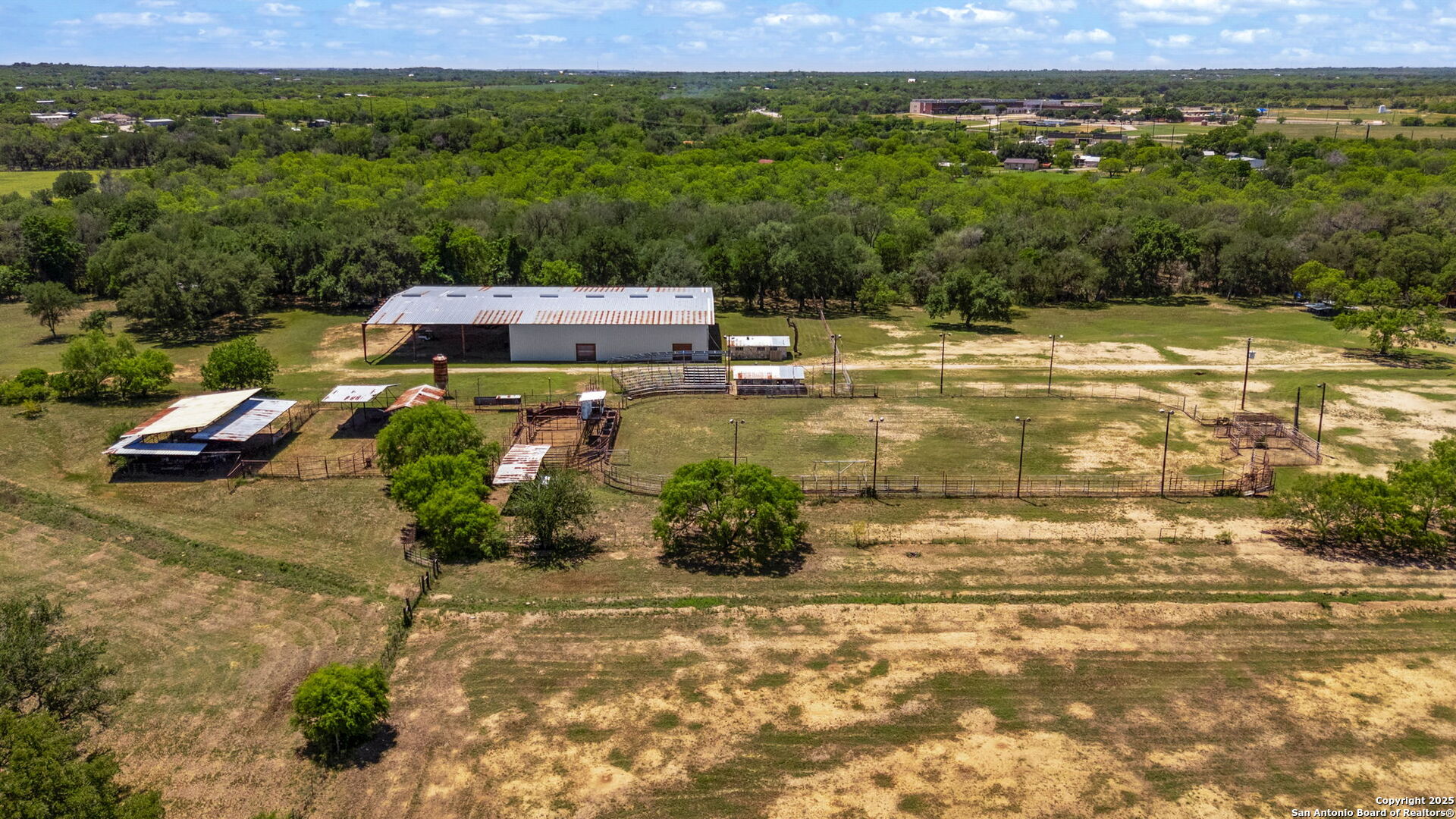 11224 Atkins Road Atascosa, TX 78002 - Photo 17 of 45 a view of a lake with a mountain