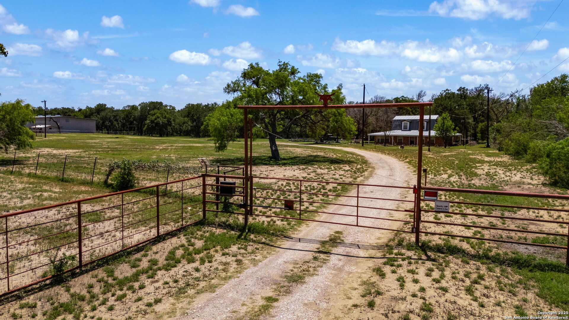 11224 Atkins Road Atascosa, TX 78002 - Photo 2 of 45 a view of a lake with a outdoor space