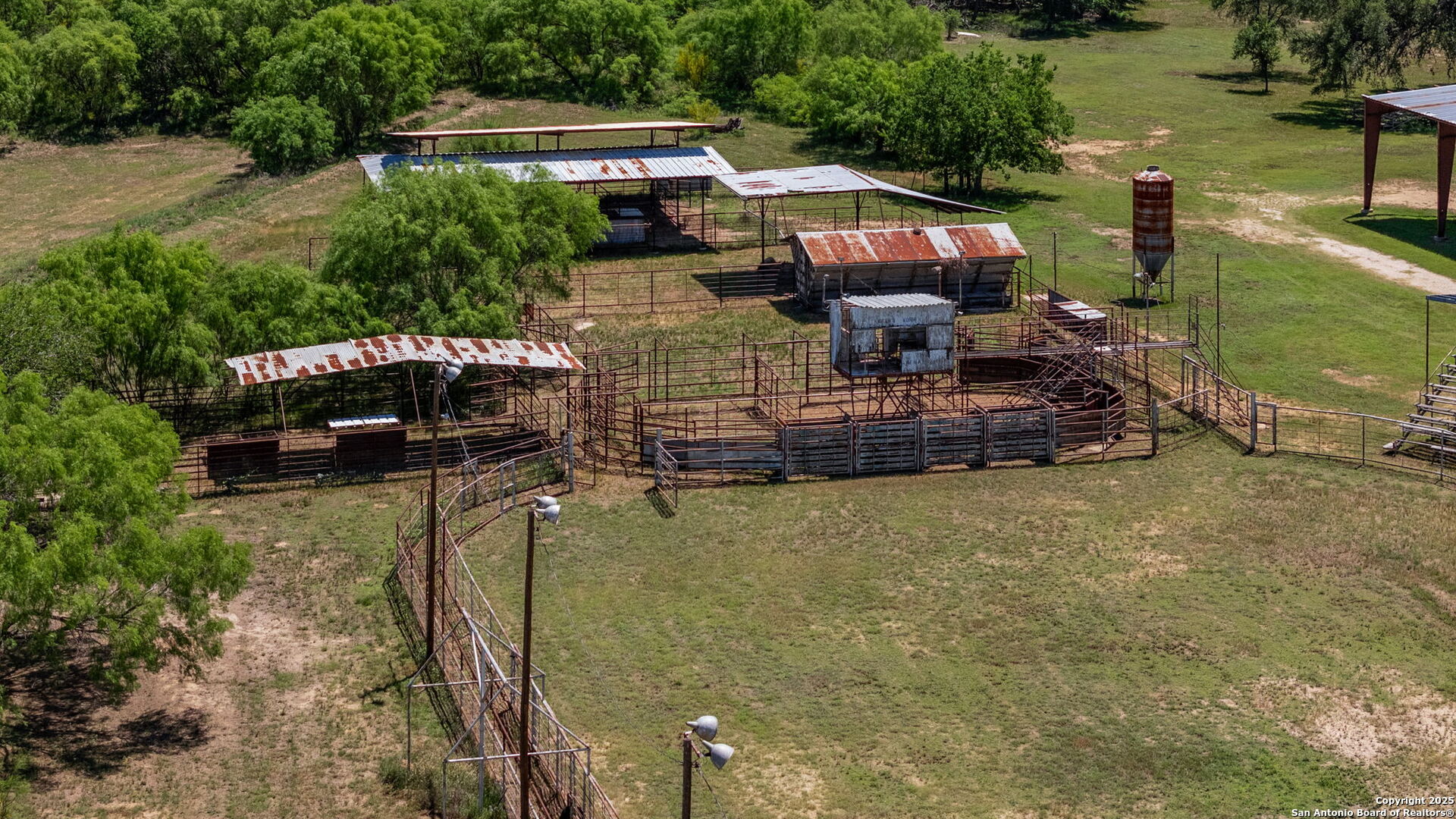 11224 Atkins Road Atascosa, TX 78002 - Photo 21 of 45 an aerial view of a house with a yard basket ball court and outdoor seating