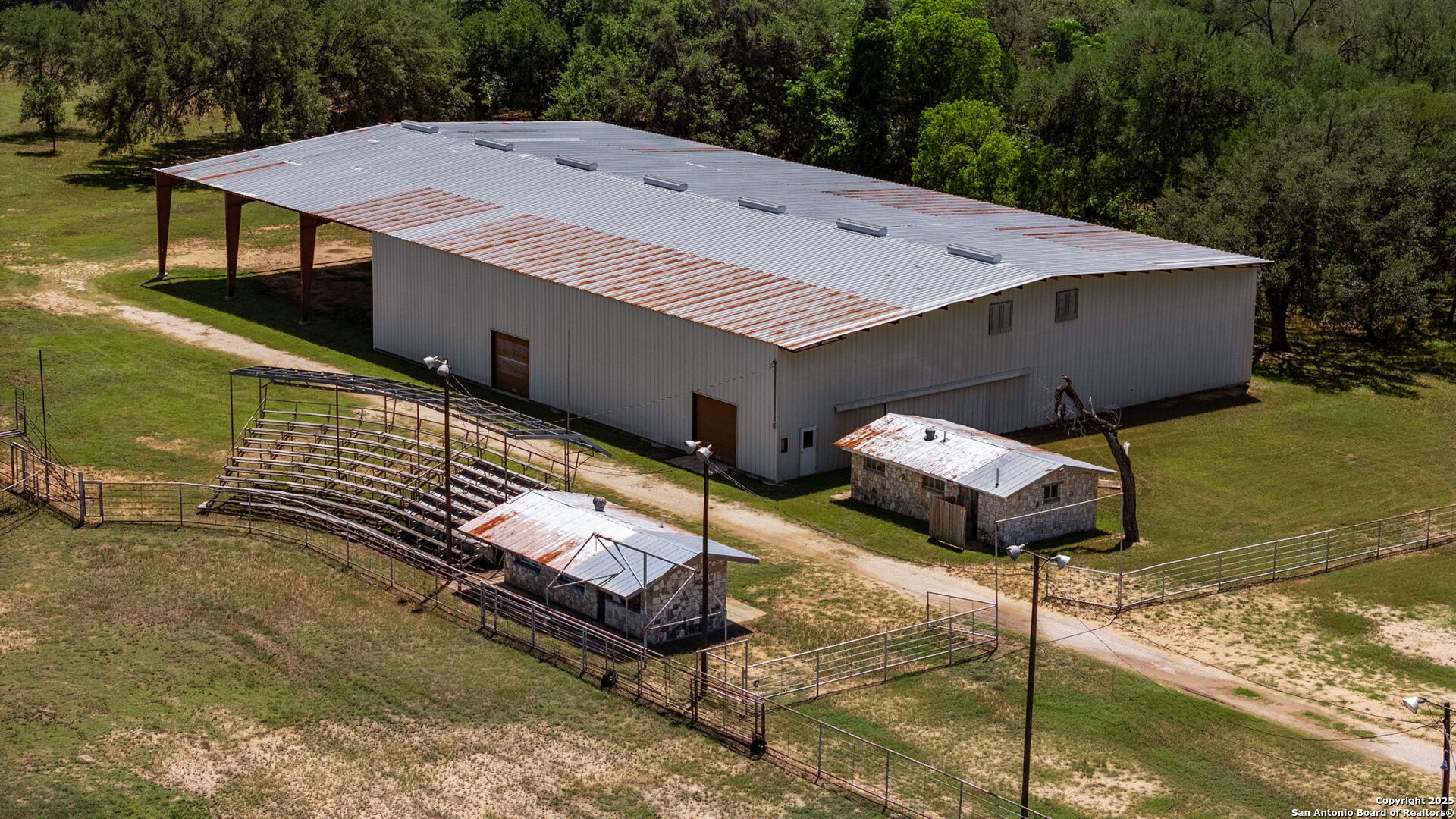 11224 Atkins Road Atascosa, TX 78002 - Photo 22 of 45 a terrace of a house with outdoor seating