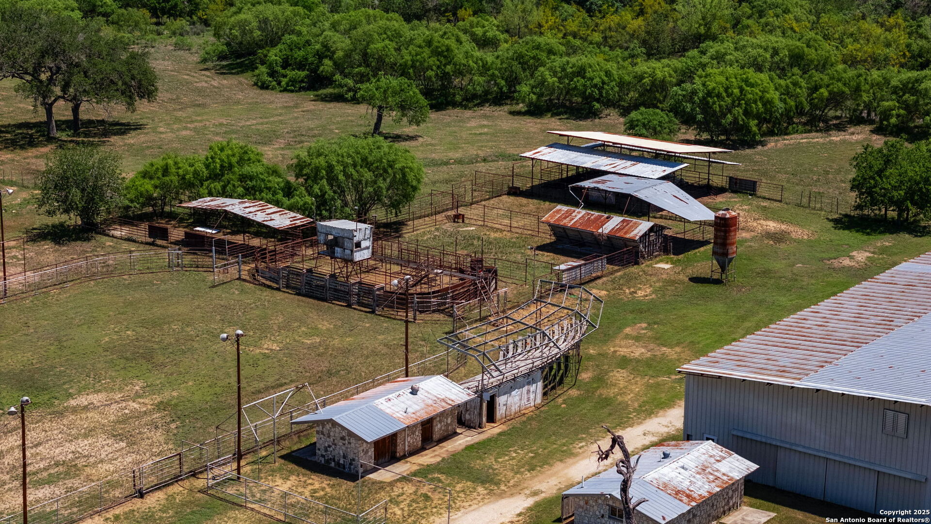 11224 Atkins Road Atascosa, TX 78002 - Photo 23 of 45 a view of a backyard with furniture