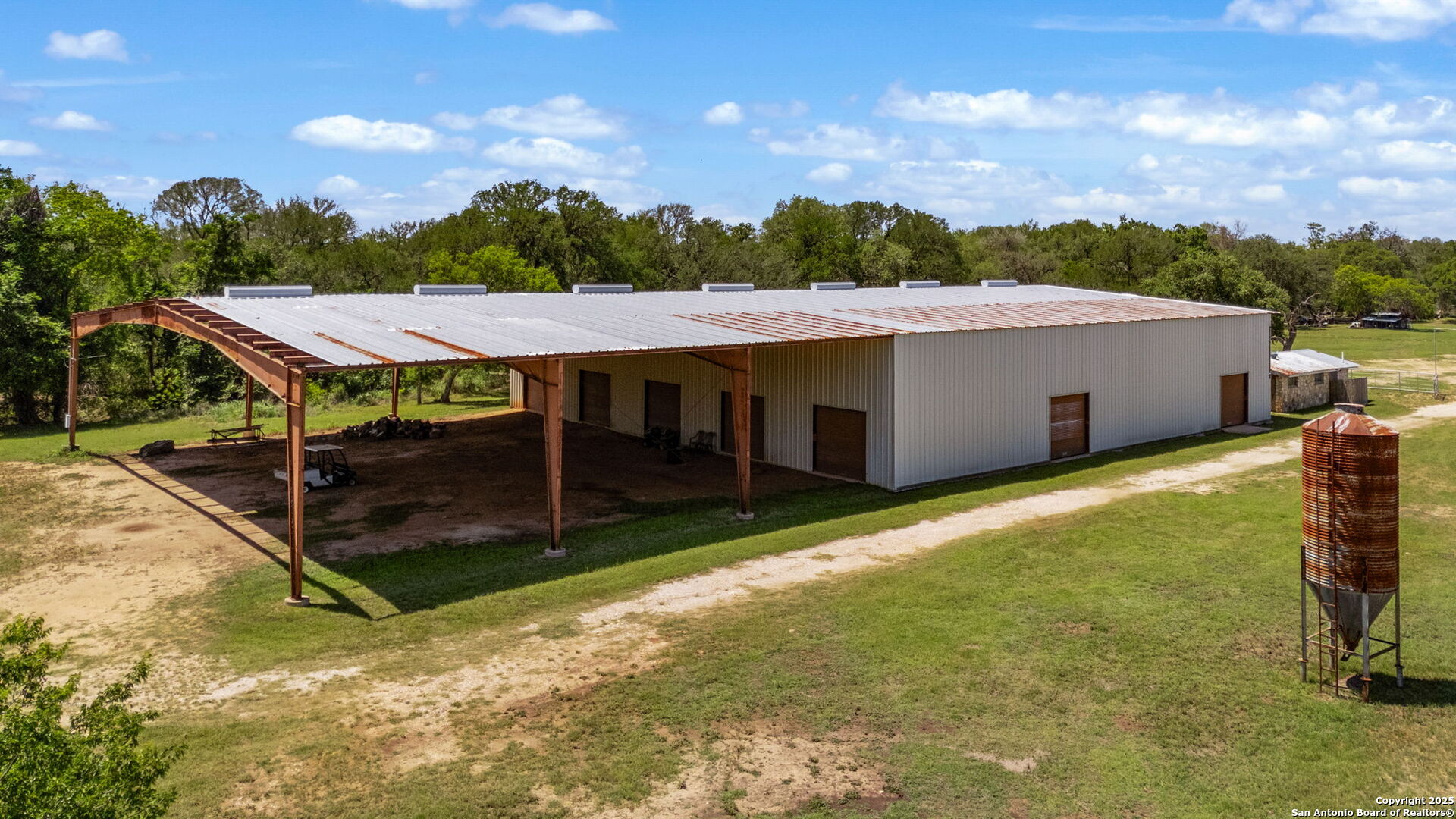 11224 Atkins Road Atascosa, TX 78002 - Photo 26 of 45 a view of a backyard
