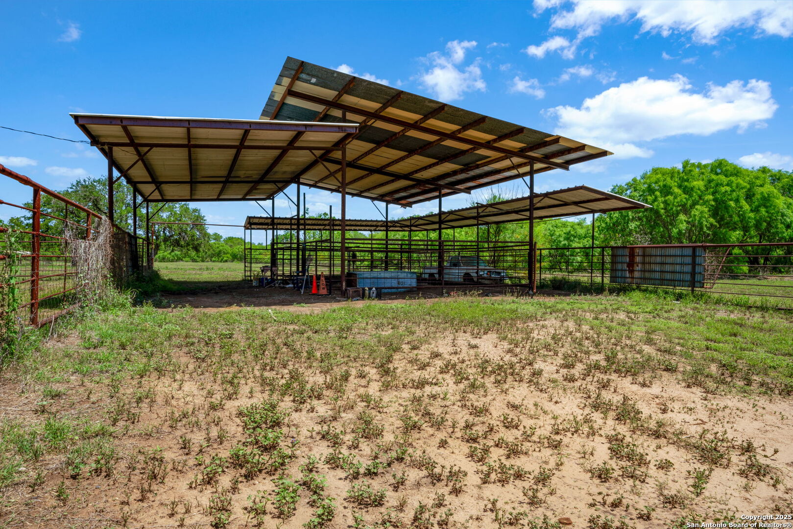 11224 Atkins Road Atascosa, TX 78002 - Photo 37 of 45 a view of a backyard