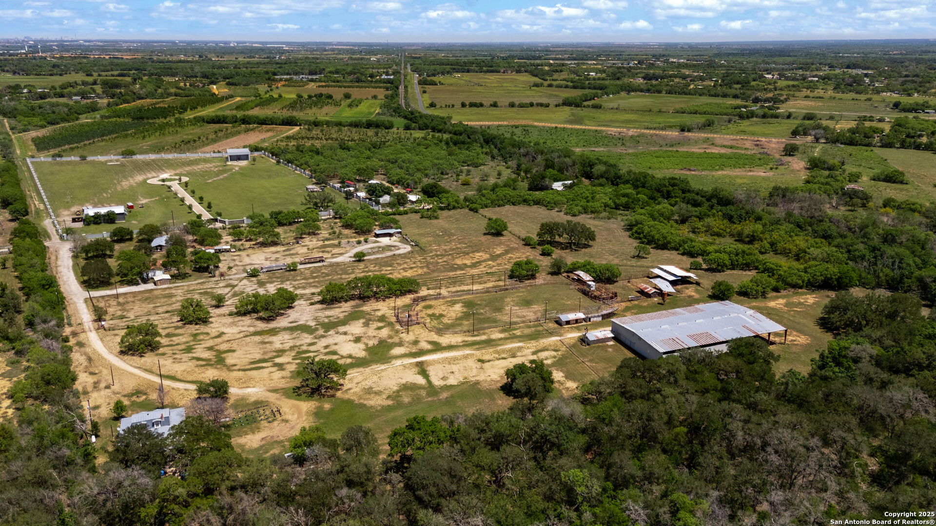 11224 Atkins Road Atascosa, TX 78002 - Photo 7 of 45 a view of a city with mountains in the background