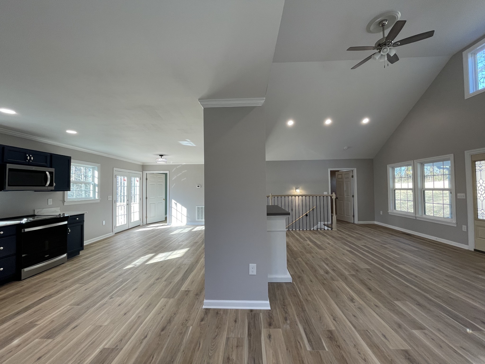 993 Throneberry Road Normandy, TN 37360 - Photo 21 of 56 a view of a big room with wooden floor a sink and windows