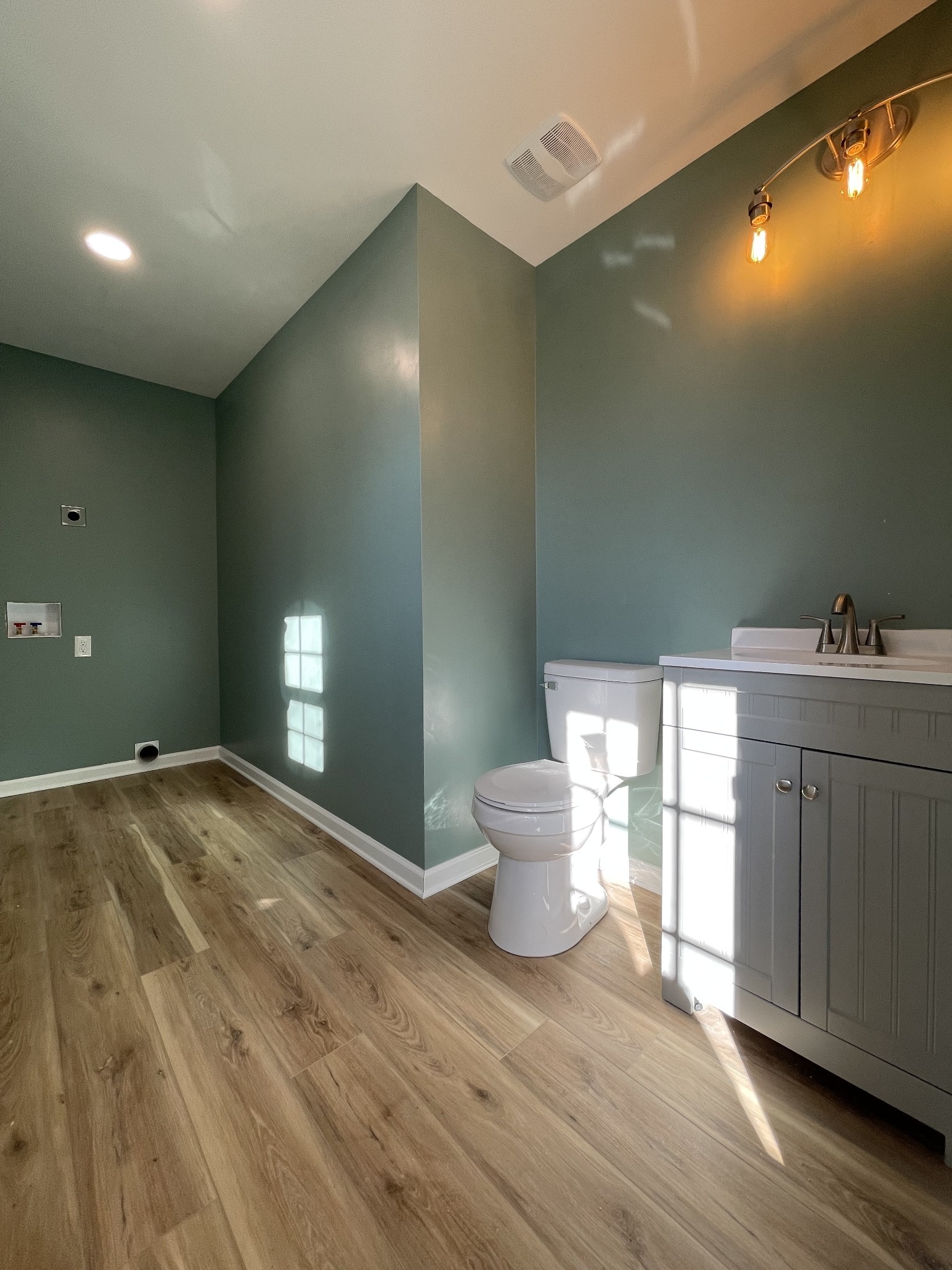 993 Throneberry Road Normandy, TN 37360 - Photo 36 of 56 a view of a kitchen with a sink and a toilet
