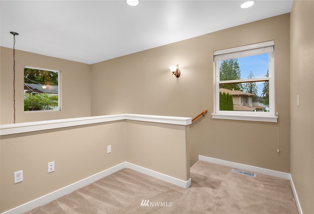 21006 42nd Avenue Southeast, Unit A Bothell, WA 98021 - Photo 11 of 19 a view of an empty room with a window