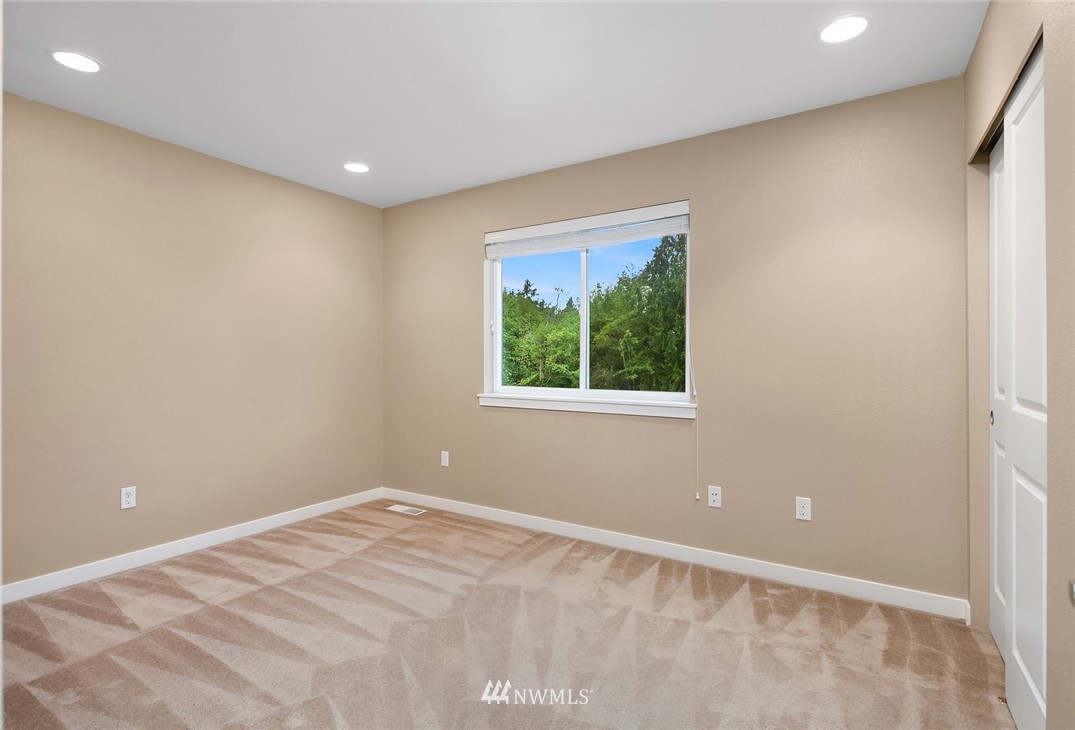 21006 42nd Avenue Southeast, Unit A Bothell, WA 98021 - Photo 12 of 19 a view of an empty room