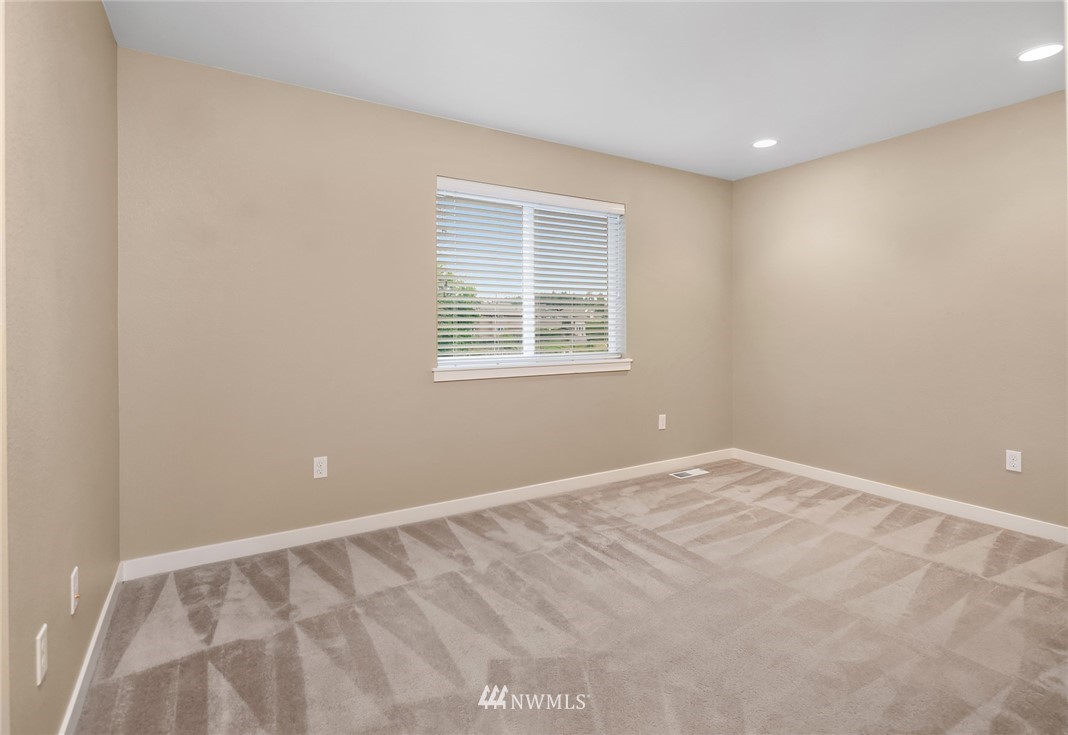 21006 42nd Avenue Southeast, Unit A Bothell, WA 98021 - Photo 14 of 19 an empty room with a window
