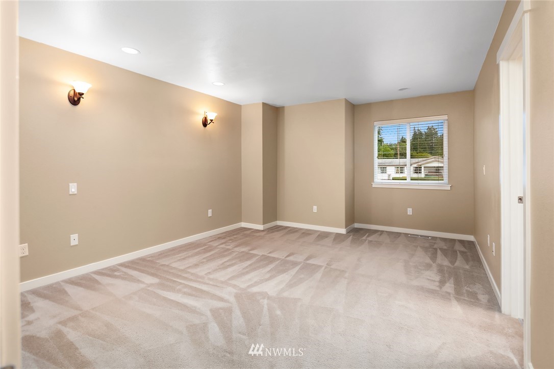 21006 42nd Avenue Southeast, Unit A Bothell, WA 98021 - Photo 15 of 19 a view of an empty room with windows