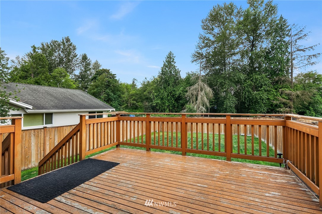 21006 42nd Avenue Southeast, Unit A Bothell, WA 98021 - Photo 17 of 19 a view of a wooden roof deck