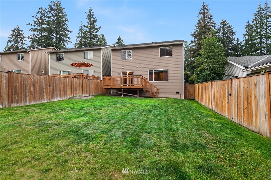 21006 42nd Avenue Southeast, Unit A Bothell, WA 98021 - Photo 18 of 19 a view of a backyard with a cabin