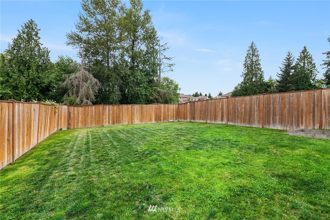 21006 42nd Avenue Southeast, Unit A Bothell, WA 98021 - Photo 19 of 19 a view of outdoor space with wooden fence