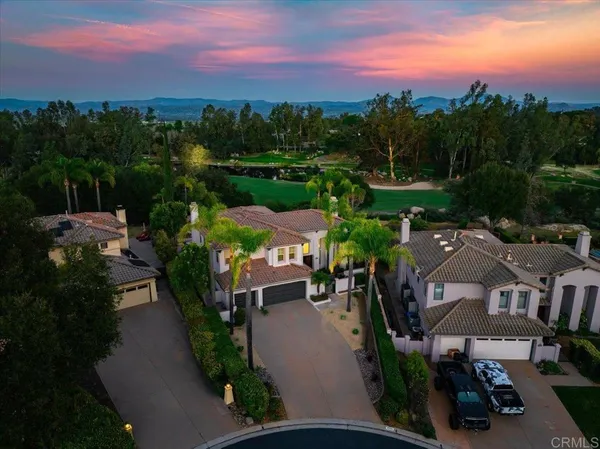 an aerial view of a houses with outdoor space and street view