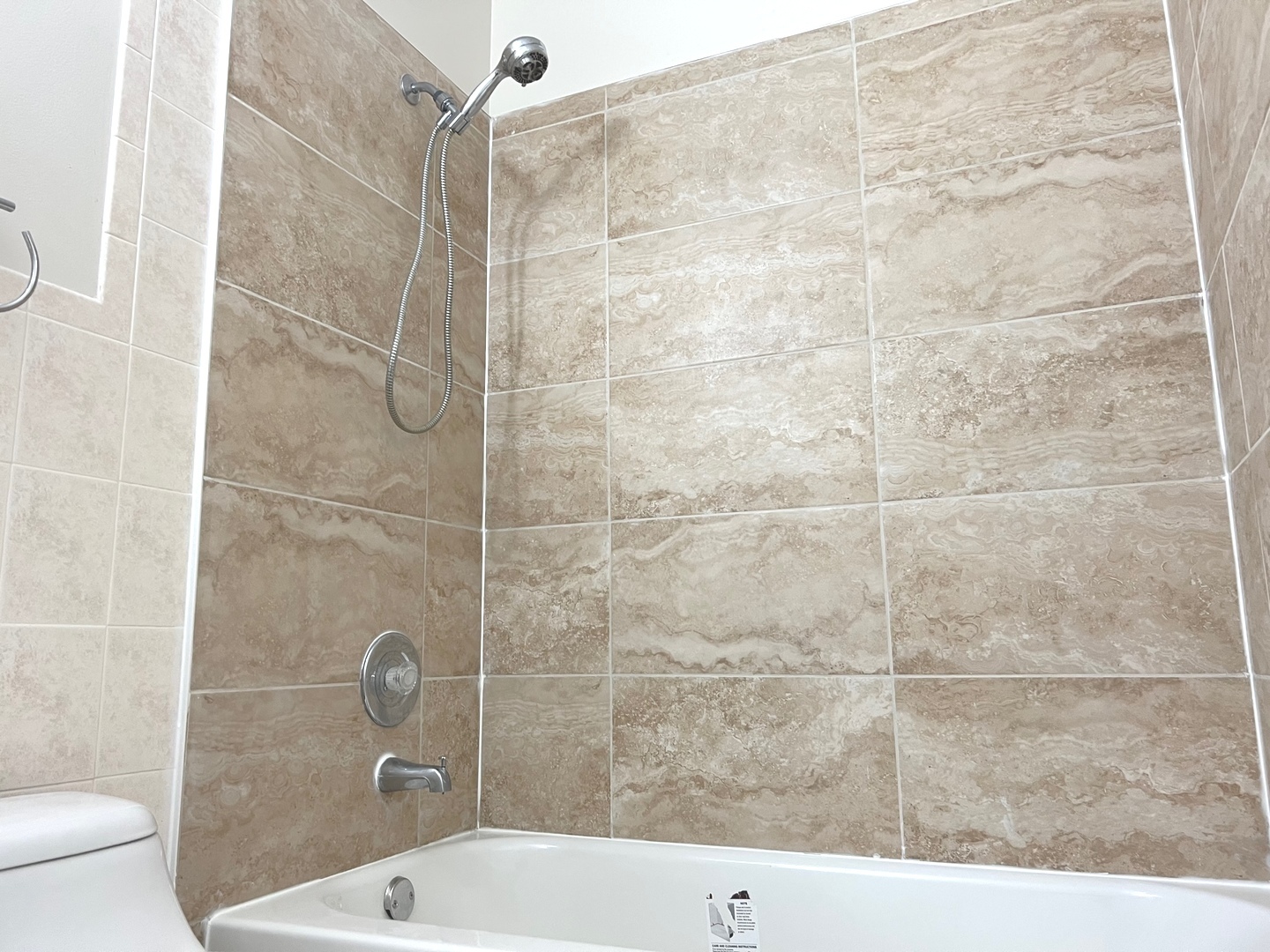 3255 Kirchoff Road, Unit 312 Rolling Meadows, IL 60008 - Photo 8 of 12 a bathroom with a shower and a toilet