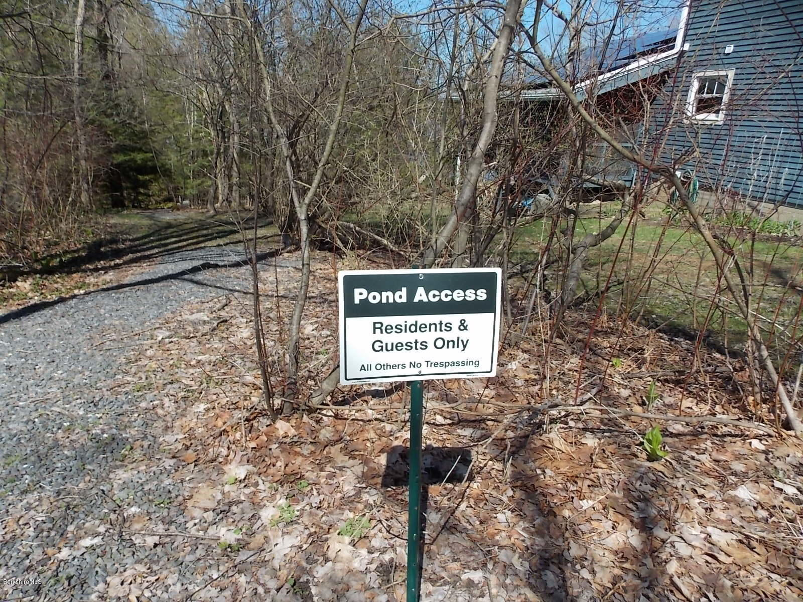 21 Lake Rd Extension Richmond, MA 01201 - Photo 40 of 44 a sign on the side of a building
