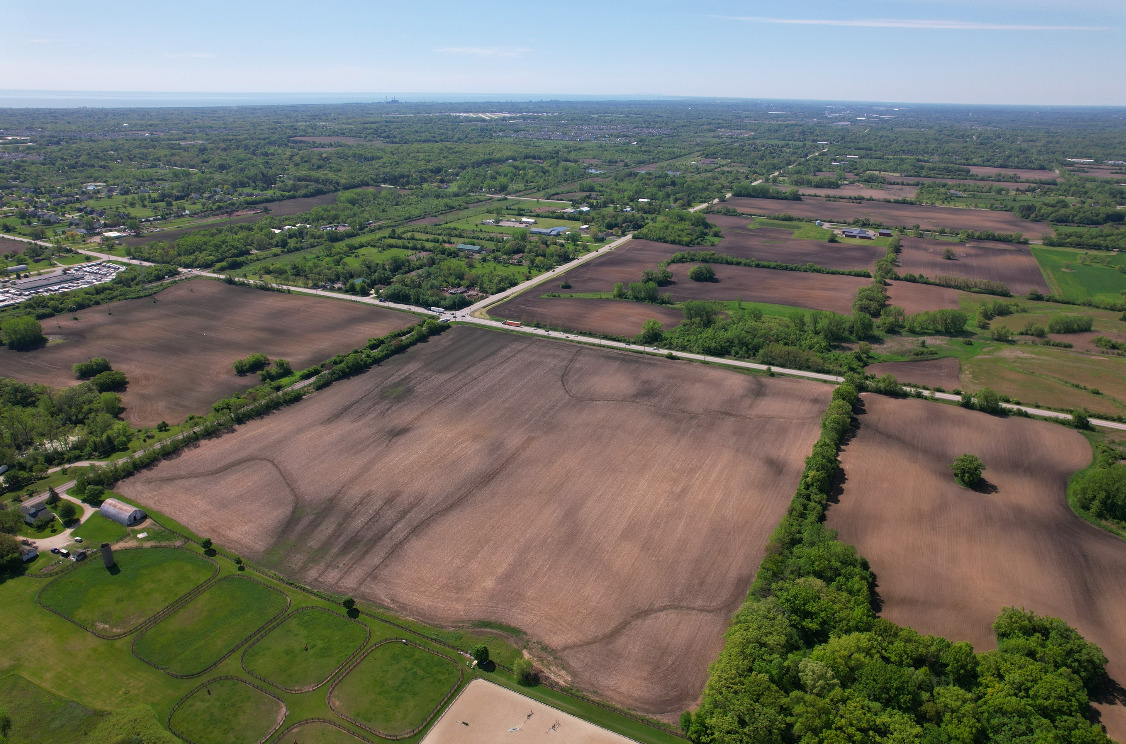 41616 North Delany Road Wadsworth, IL 60099 - Photo 11 of 37 an aerial view of a house with a garden