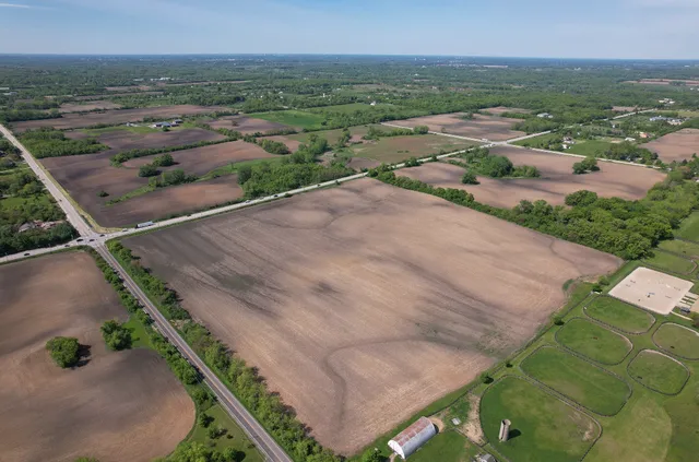 an aerial view of a house with a garden