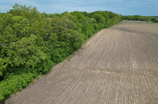 a view of an ocean beach and mountain
