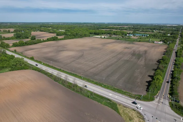 a view of a road with an ocean view