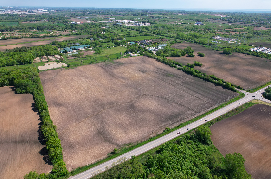 41616 North Delany Road Wadsworth, IL 60099 - Photo 6 of 37 an aerial view of a city with mountains