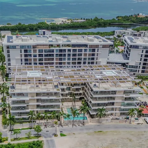 front view of a building with a yard